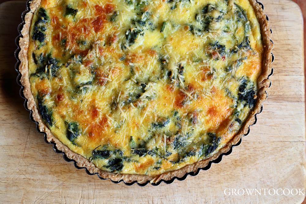 nettle quiche with sesame seed crust