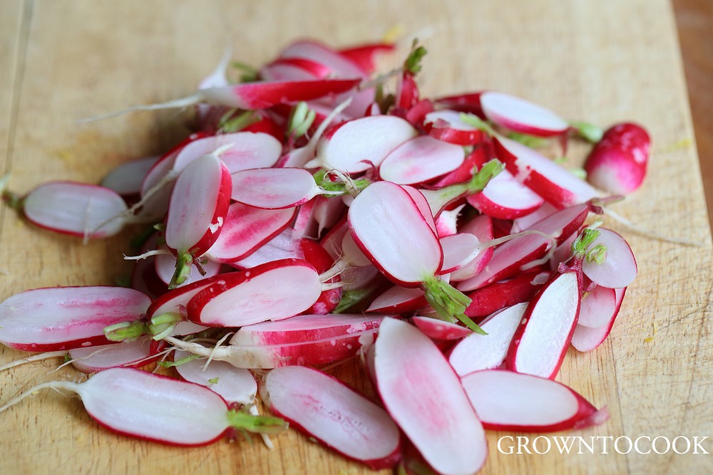 thinly sliced radishes