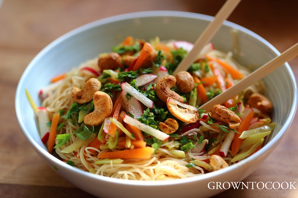 Chinese noodle salad with citrus, snow peas and spicy cashews