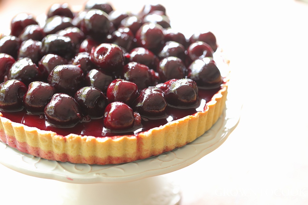 chocolate sesame cream tart with cherries