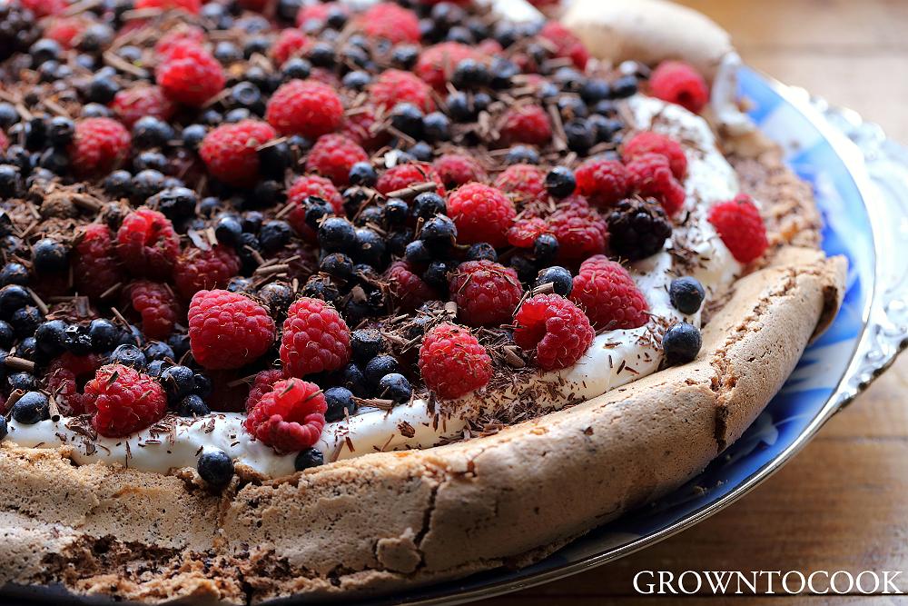 chocolate pavlova with forest fruits 