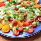 Tomato salad with feta and basil dressing