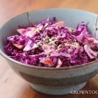 Red cabbage slaw with ginger-yogurt dressing